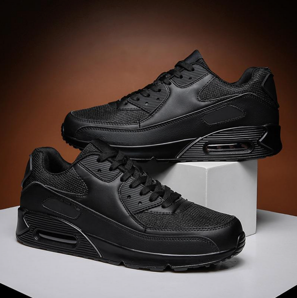 Mehrfarbige Herren Sportschuhe (schwarz-weiß) mit Dämpfung, bieten sicheren Halt für ganztägigen Komfort.