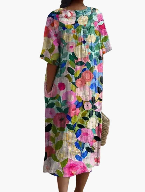 Vintage Blumenkleid für Damen, lockeres Midikleid mit kurzen Ärmeln, ideal für Sommer und Alltag.