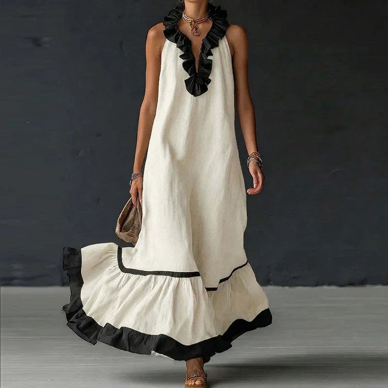 Stilvolles ärmelloses Damen Sommer Maxikleid mit eleganten Rüschen, tiefem V-Ausschnitt und fließendem Schnitt.