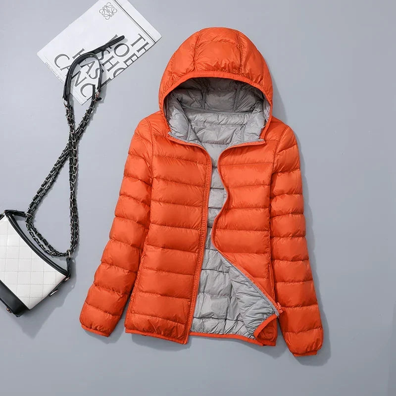 Atmungsaktive Kapuzen-Windjacke für Damen, wendbar, sportlich-elegant, für Frühjahr/Herbst.