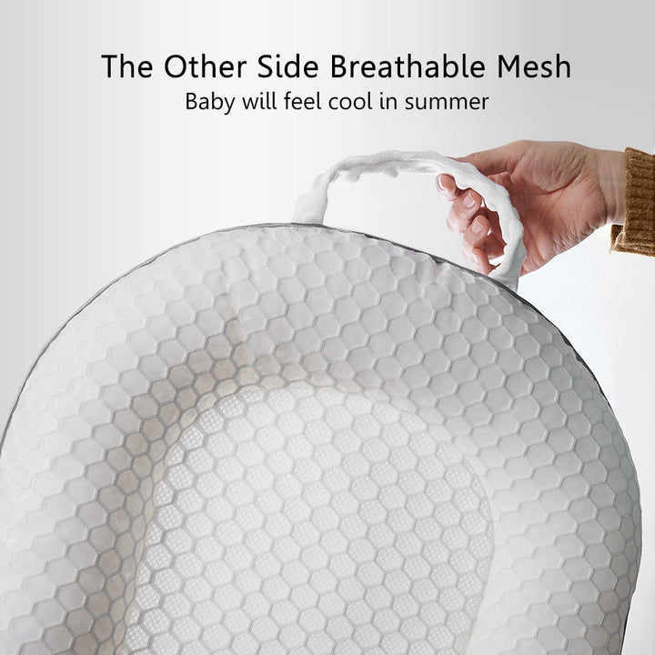 Detailaufnahme des atmungsaktiven Mesh-Gewebes vom Babynest für sicheren und komfortablen Babyschlaf.