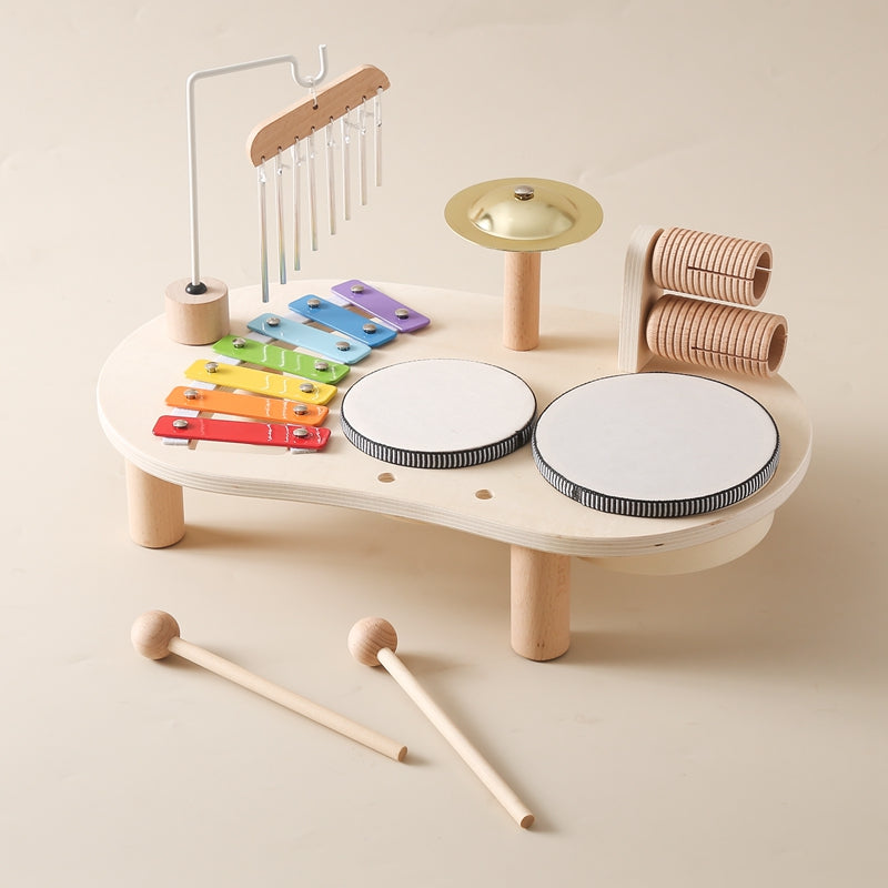 Hochwertiges Holzmusikspielzeug für Kleinkinder, robust und sicher, mit Xylophon und Trommeln für kreatives Spielen.