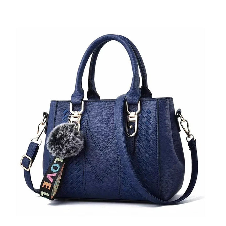 Elegante Damen Leder Umhängetasche mit detailreicher Stickerei; vielseitig als Schultertasche für den Alltag.