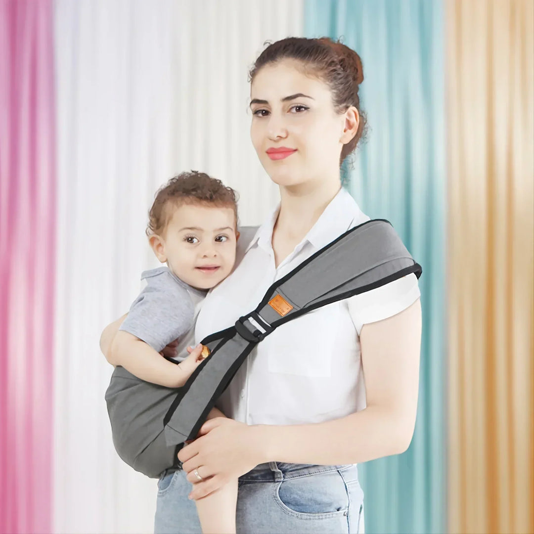 Rosa Baby-Hüfttrage für Kleinkinder & Babys. Ergonomische, leichtgewichtige Tragehilfe, ideal für stilbewusste Eltern.