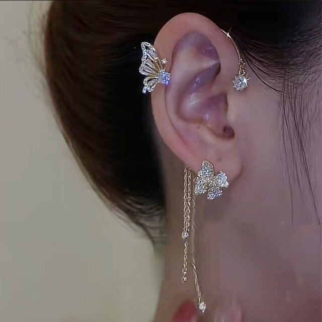 Tragebild: Elegante Damen Schmetterlings-Ohrmanschette, kein Piercing, strahlender Zirkonia-Schmuck.