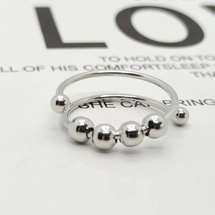 Eleganter Damen Anti-Stress-Ring in Silber, Gold oder Roségold, drehbarer Fingerring zum Stressabbau.