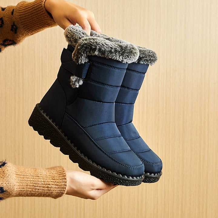 Elegante Slip-On Damen Schneestiefel, halten Füße im Winter warm und trocken, bequemer Stil.