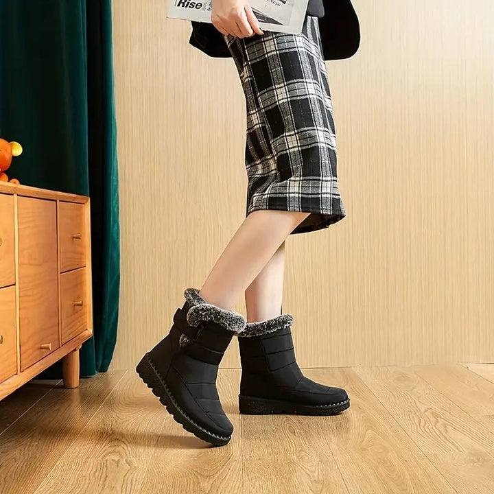 Robuste, rutschfeste Sohle der wasserabweisenden Damen Outdoor Stiefel, ideal für Schnee und Eis.