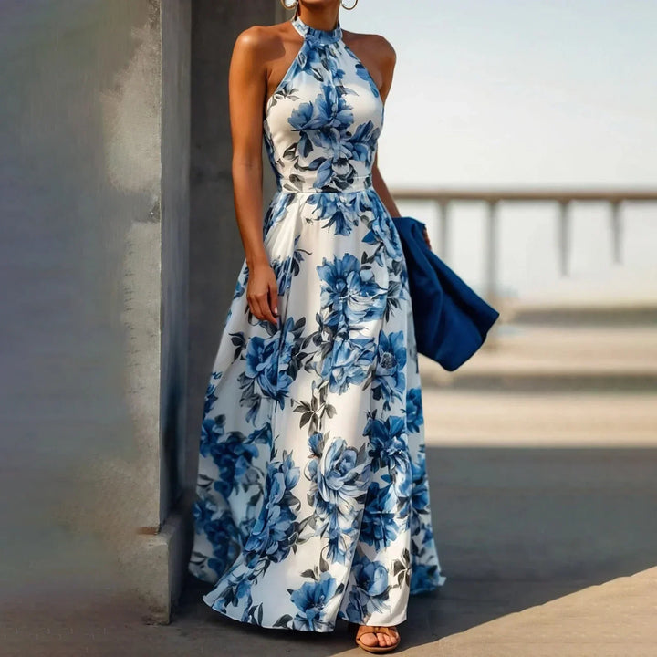 Elegantes Damen Maxikleid mit floralem Muster, hoher Taille & fließendem Stoff, perfekt für Sommer & Urlaub.