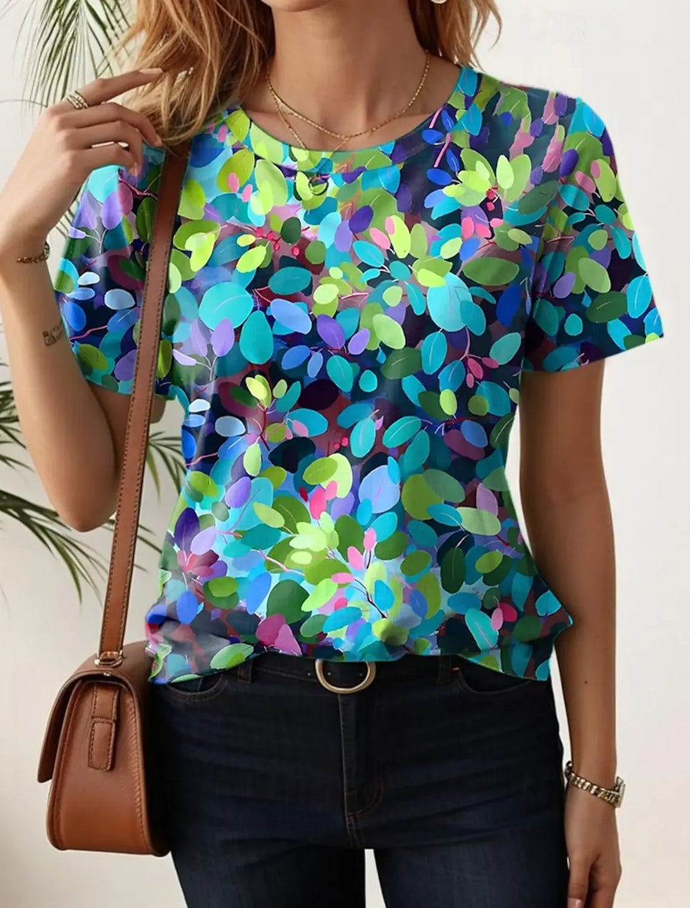 Mehrfarbiges Damen Sommer Oberteil mit Blumen Grafik. Lässiges Kurzarm Longshirt, ideal für Freizeit.