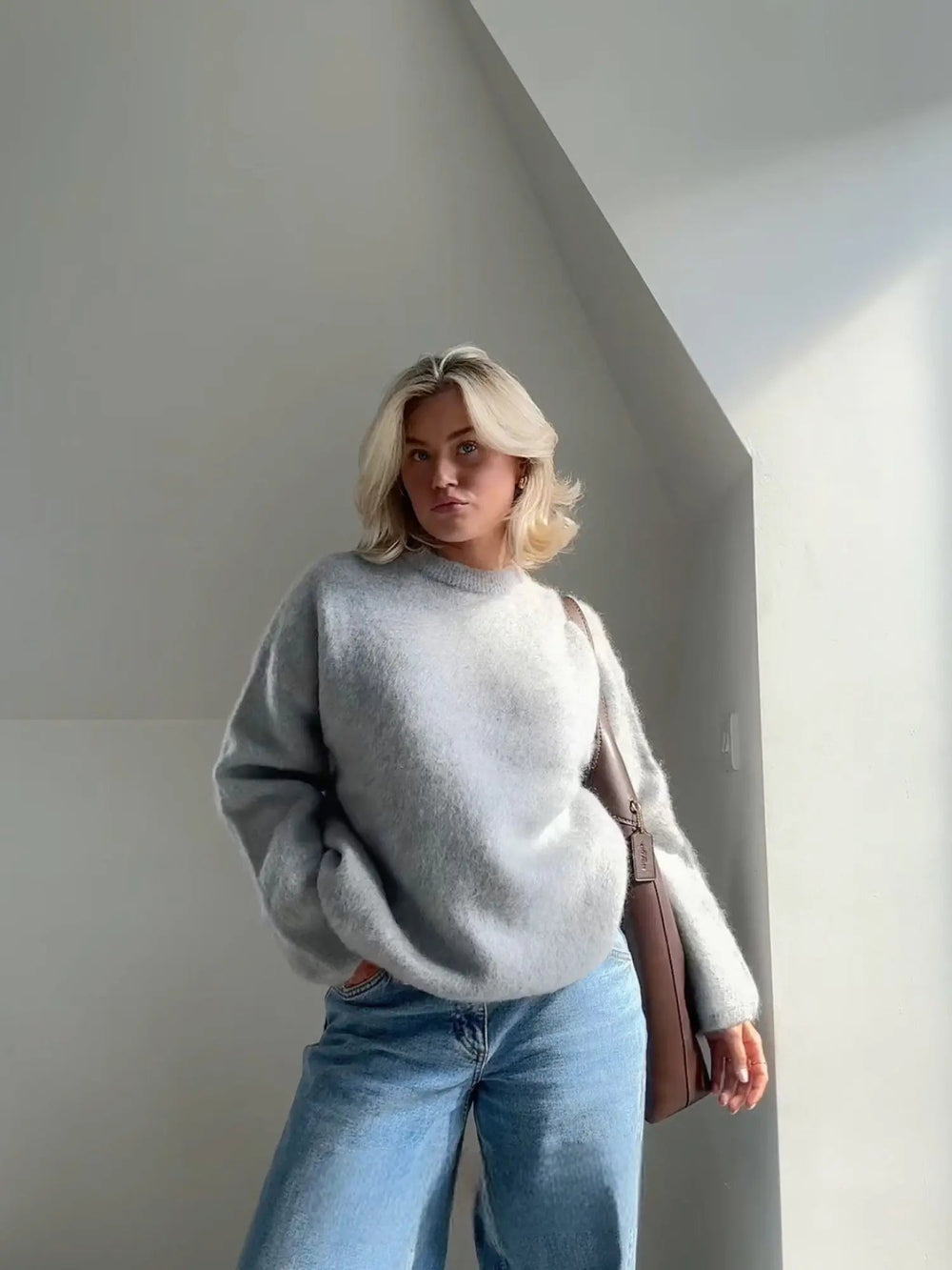 Komfortabler Damen Pullover mit lockerer Passform, ideal für Frühjahr und Herbst. Zeitloses Design für feminine Eleganz.