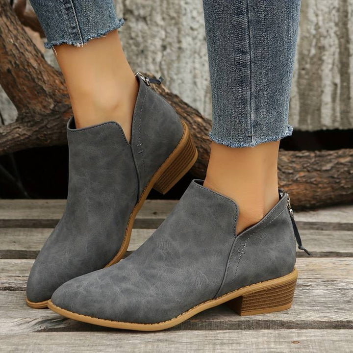 Schicke Damen Stiefeletten Traudel: vielseitige Herbst- und Winterschuhe mit elegantem Blockabsatz und Komfort.