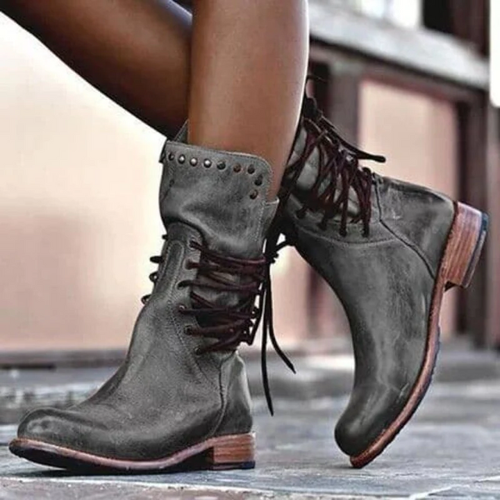 Graue Vintage-Stiefeletten für Damen mit Schnürung & robustem Blockabsatz, ideal für jede Jahreszeit.