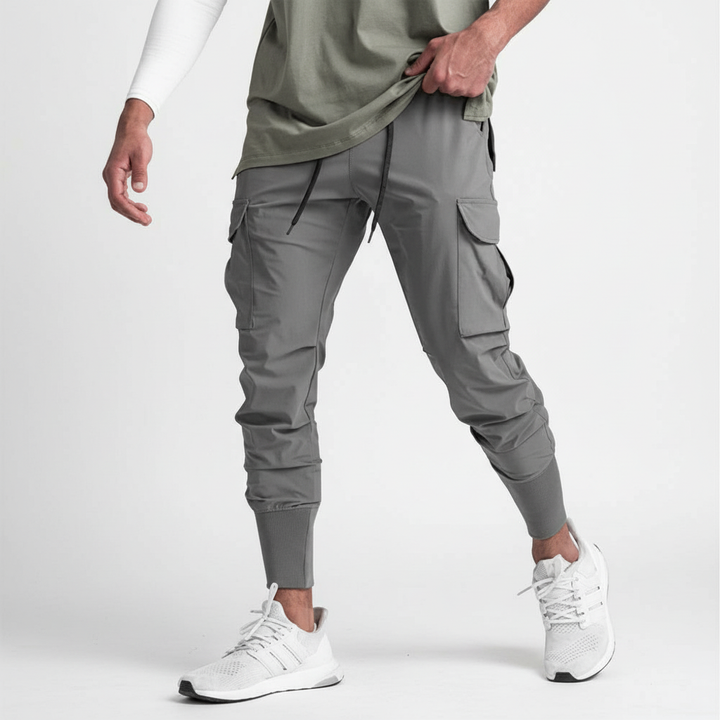 Robuste Herren Stretch Cargohose mit zahlreichen Taschen, ideal für Outdoor und urbanes Leben.
