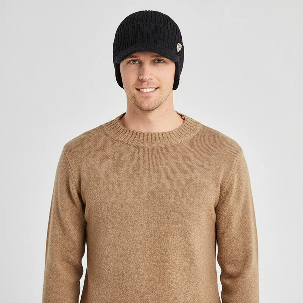 Stylische Unisex Strickmütze mit Ohrenklappen in Grau. Perfekte Kopfbedeckung für Winteraccessoires.