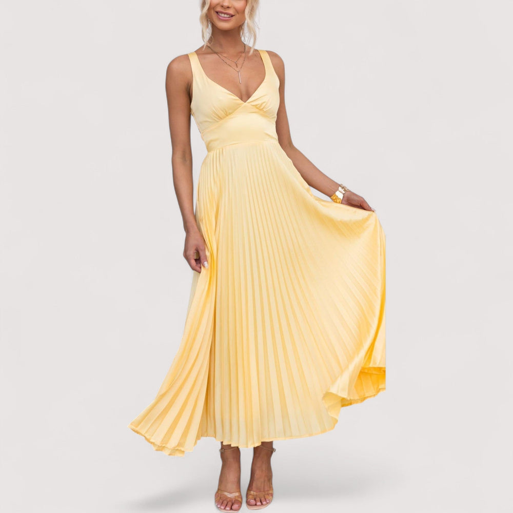 Figurbetontes Sommerkleid für Damen mit tiefem V-Ausschnitt. Elegant und bequem für warme Tage.