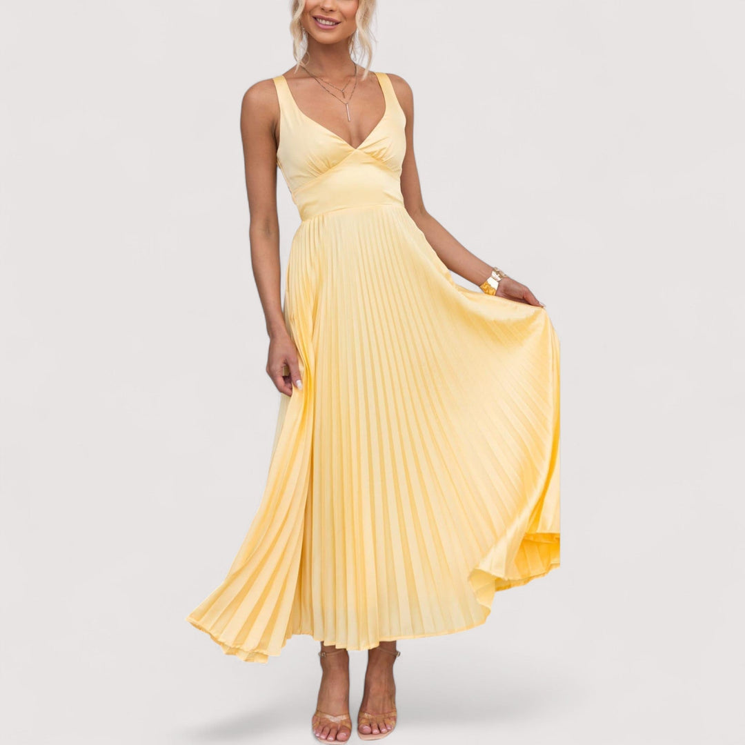 Figurbetontes Sommerkleid für Damen mit tiefem V-Ausschnitt. Elegant und bequem für warme Tage.