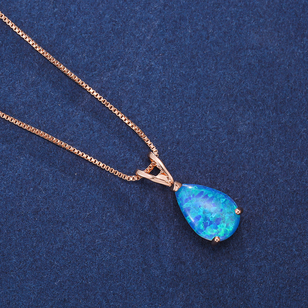 Damen-Schmuck: Tropfenförmiger Opal-Anhänger, elegant und zeitlos, inklusive Kette.