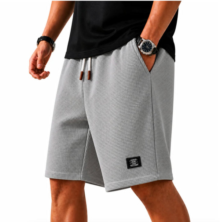 Moderne Herren Bermuda Shorts für den Sommer, bequem & leicht, ideal für Freizeit & Strand.