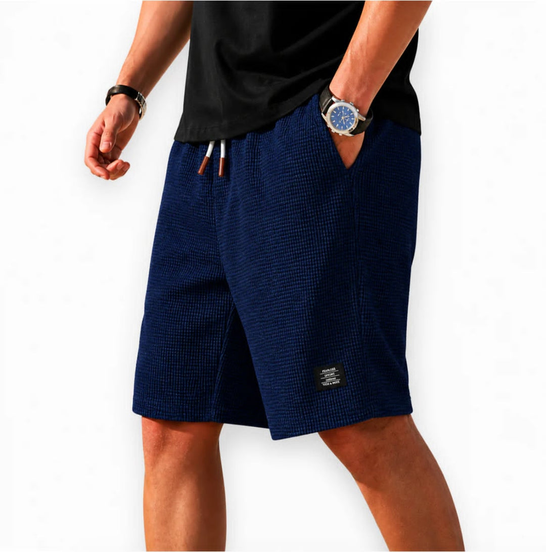 Leichte Herren Freizeitshorts, atmungsaktiv & modern, ideal als kurze Sommerhose für jeden Anlass.