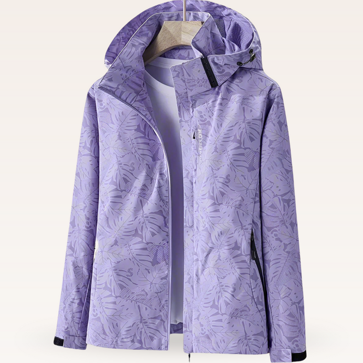 Modische Damen-Regenjacke, wasserdicht mit elegantem Blattmuster. Perfekt für Outdoor- & Freizeitaktivitäten.