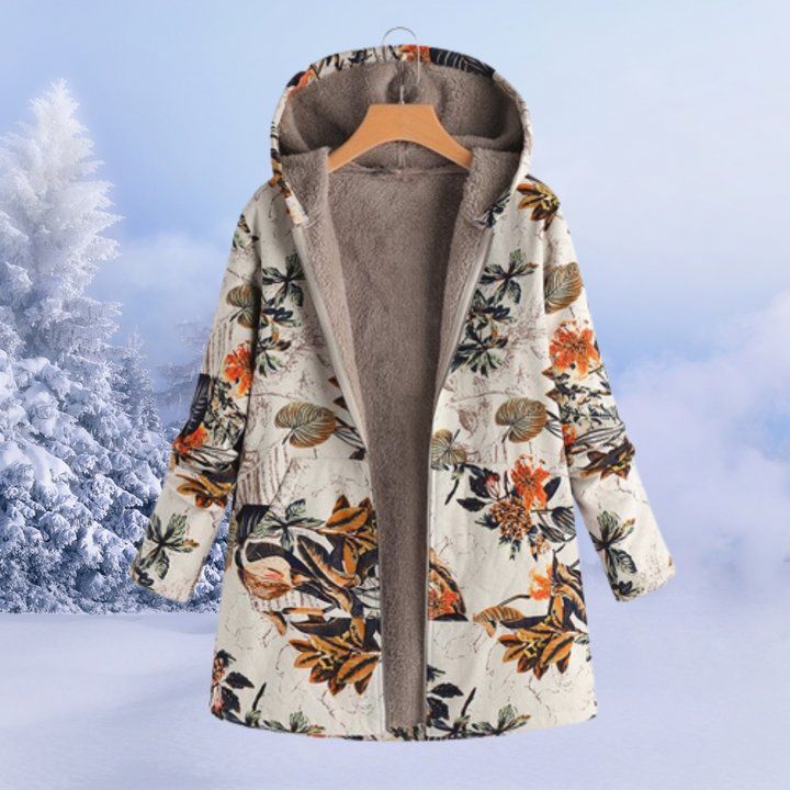 Damen Winter-Steppmantel, langer Schnitt und Kapuze. Eine bequeme und modische Jacke für Frauen.