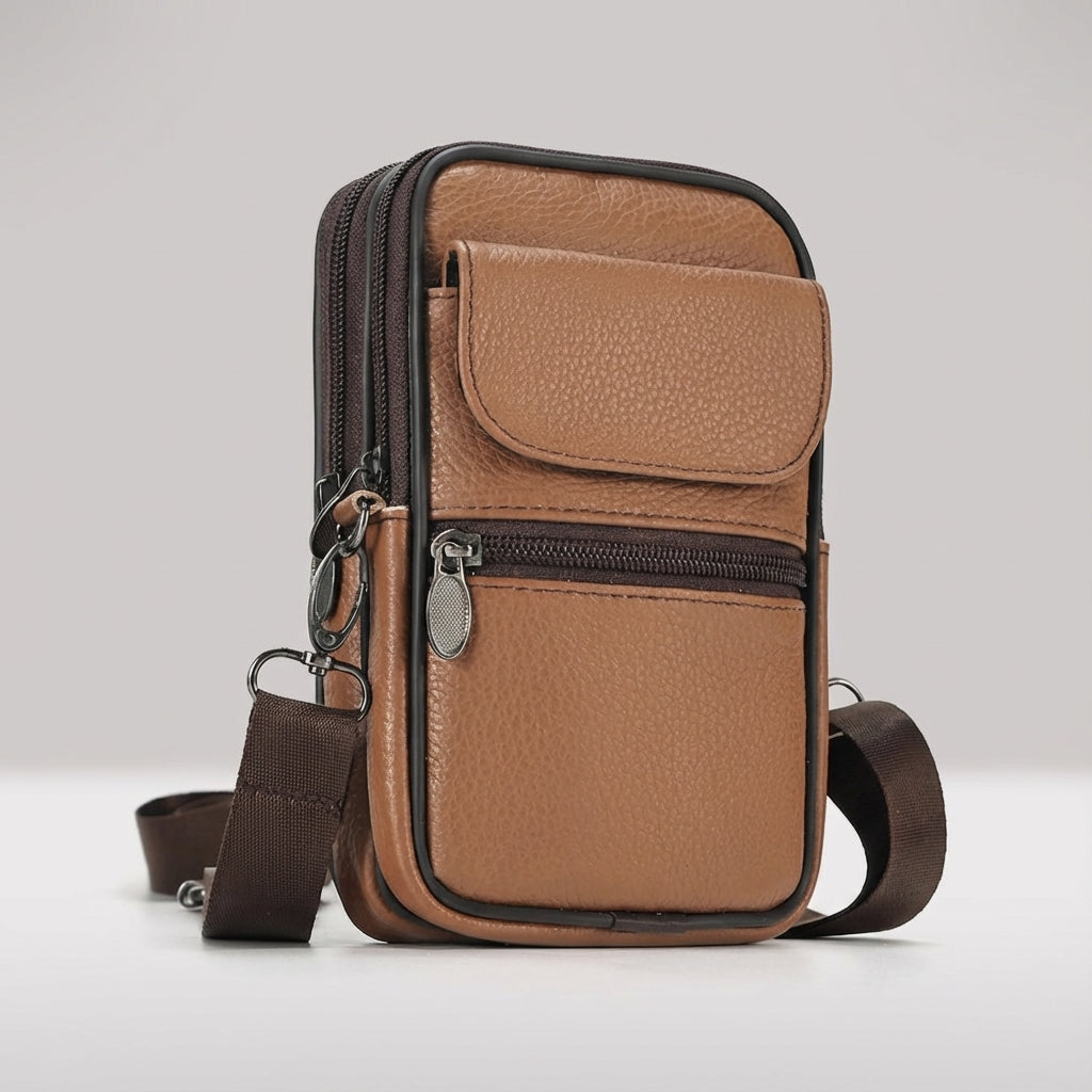 Detailansicht des Reißverschlusses der LeatherLuxe Leder Crossbody Umhängetasche. Hochwertige, verstellbare Ledertasche.