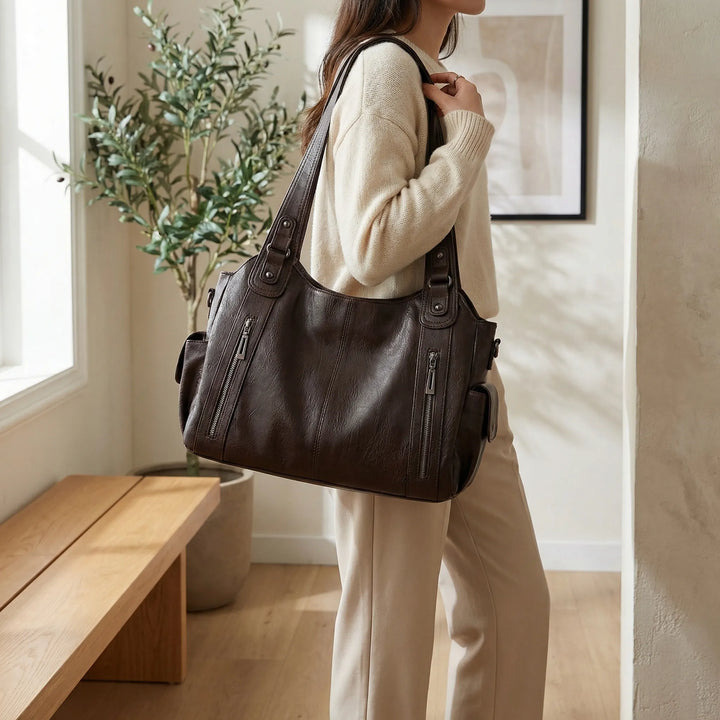 Elegante braune Damen Crossover Tasche Nikita, modisch & praktisch für Alltag. Umhängetasche mit Organizerfunktion.