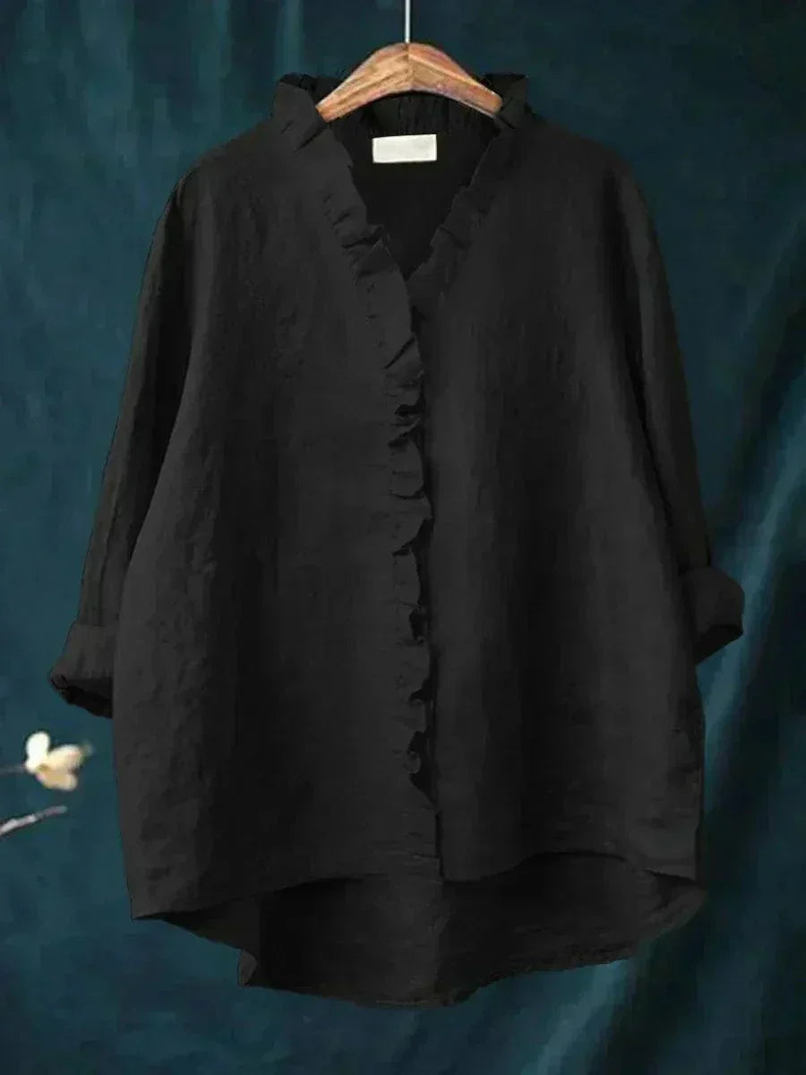 Rückenansicht der bequemen Viva Damenbluse mit lockerem Schnitt, ideal für Komfort und Eleganz.