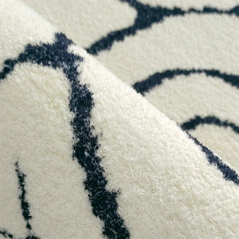 Pflegeleichter Wellen Teppich mit modernem abstraktem Design. Langlebiger Teppich für stilvolle Einrichtung.