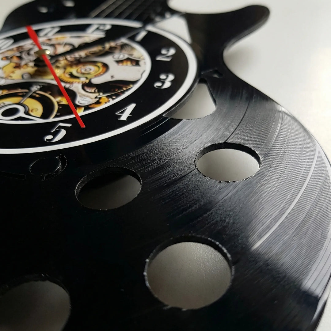 Stylische Design-Wanduhr als Gitarre, ein Hingucker für Musikfans. Dekorative Analoguhr fürs Wohnzimmer.