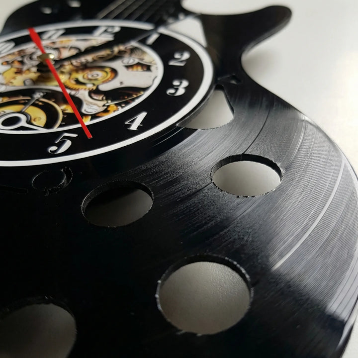 Stylische Design-Wanduhr als Gitarre, ein Hingucker für Musikfans. Dekorative Analoguhr fürs Wohnzimmer.