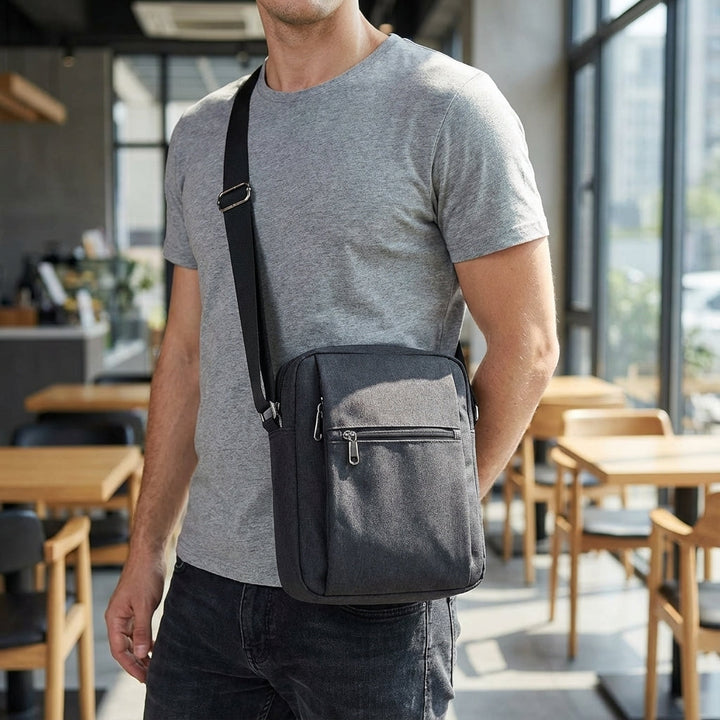 Unisex wasserabweisende Sling-Tasche mit mehreren Fächern, ideal für Reise & Alltag, schützt Wertsachen.