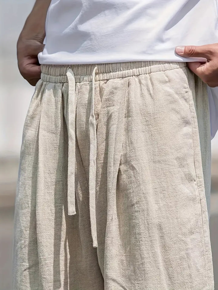 Modische Herrenhose Xavier: beige, weite Baggy-Passform für entspannten Komfort und modernen Streetwear-Look.