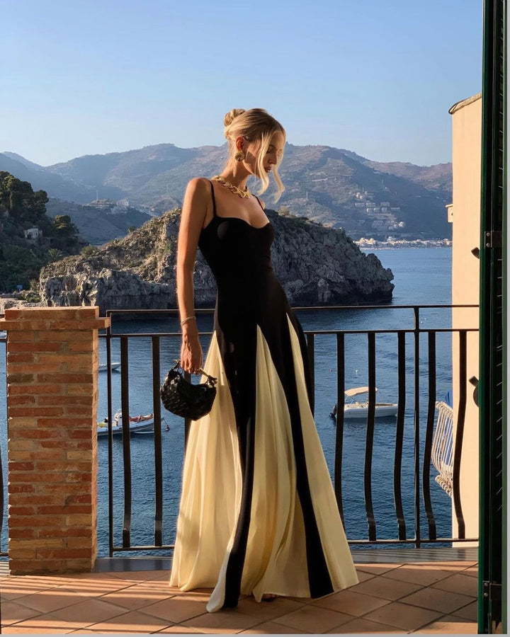 Schickes Hochzeitsgastkleid, schwarzes Maxikleid mit Spaghettiträgern und elegantem Schnitt.