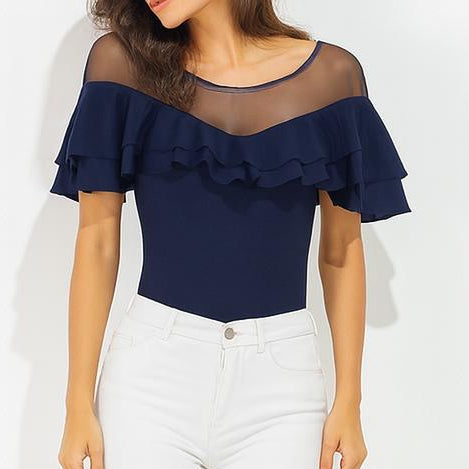 Figurbetontes Damen Oberteil, Langarm, mit transparentem Detail, elegant & modisch.