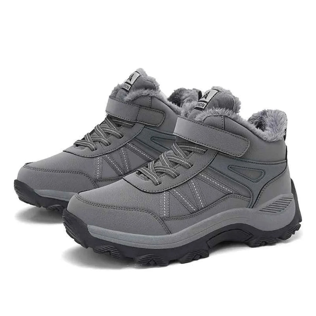 Komfortable Damenschuhe: Gefütterte Winterstiefel mit Klettverschluss für warme Füße.