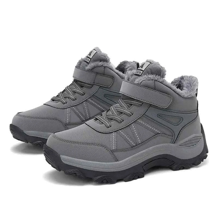 Komfortable Damenschuhe: Gefütterte Winterstiefel mit Klettverschluss für warme Füße.
