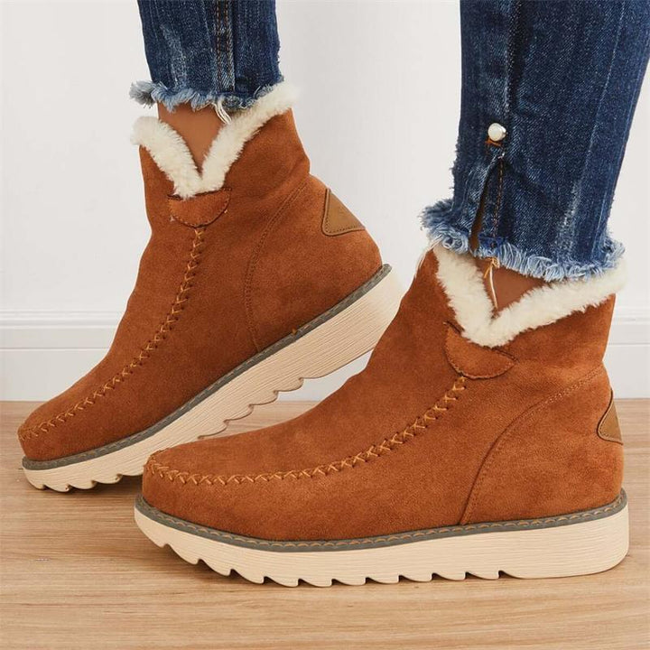 Warme Damen Winterstiefel mit weichem Futter und robustem Design. Optimal für kalte Wintertage und Schneebedingungen.