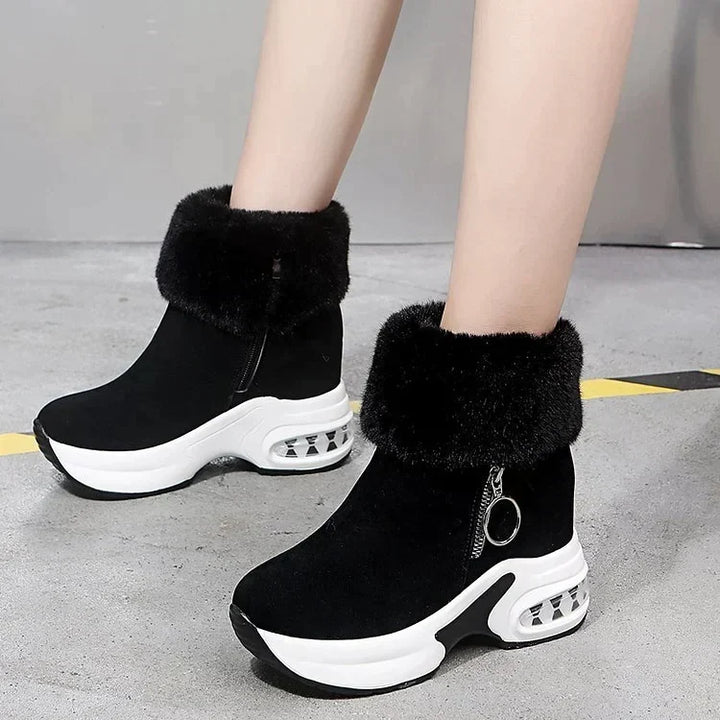 Funktionelle graue Damen Boots, wind- & wasserabweisend, mit gedämpfter Sohle für alle Winteraktivitäten.