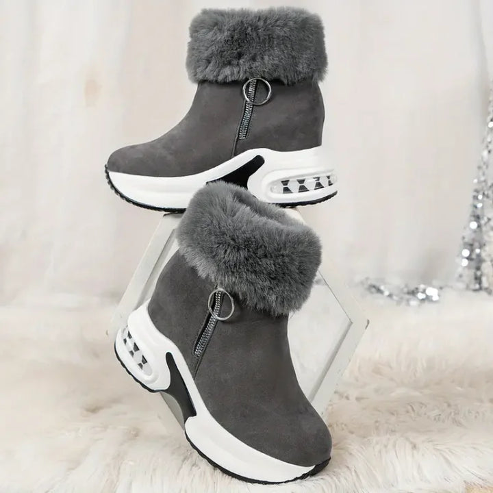Komfortable schwarze Damenstiefel mit Luftkissen-Technologie, perfekt für lange Winterspaziergänge.