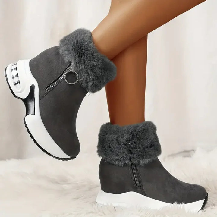 Trendige graue Winterstiefel für Damen, ultraleicht und bequem, mit atmungsaktivem Innenfutter.