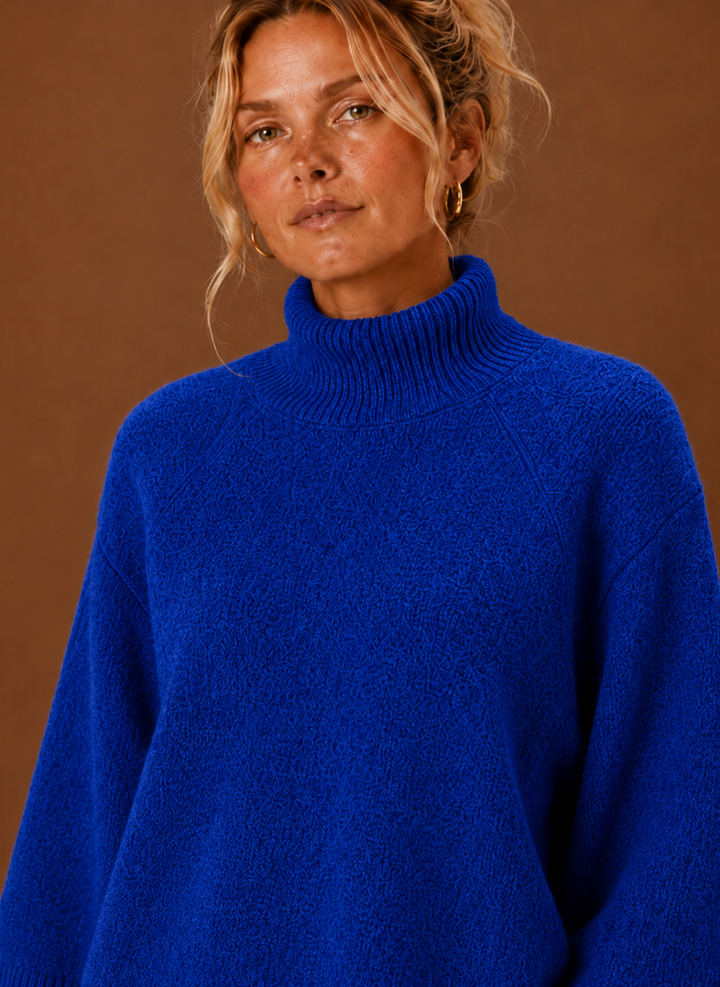 Kuscheliger Damensweater mit weitem Schnitt & modischem Stehkragen. Ein Must-have für deine Wintergarderobe.