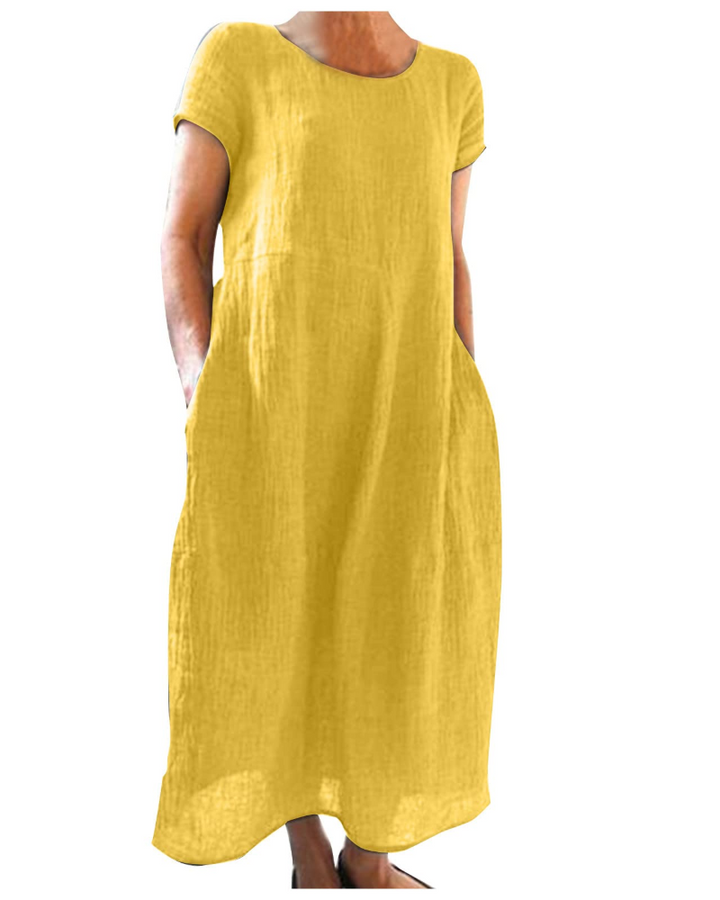 Fließendes Damen Maxikleid mit Kurzarm, seitlichen Taschen und A-Linie, ideal als Freizeit- oder Strandkleid.