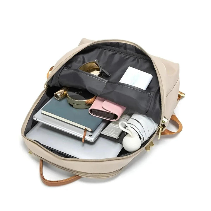 Hochwertiger Damen Businessrucksack in Grau. Großes 14-Zoll Laptopfach, organisiert.