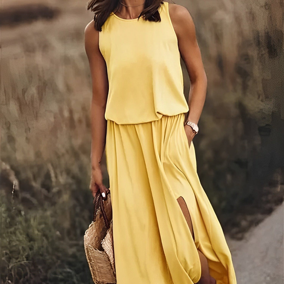 Schickes Damen Sommerkleid, ärmellos mit fließendem Schnitt. Das elegante Retro-Muster macht es zum Hingucker.