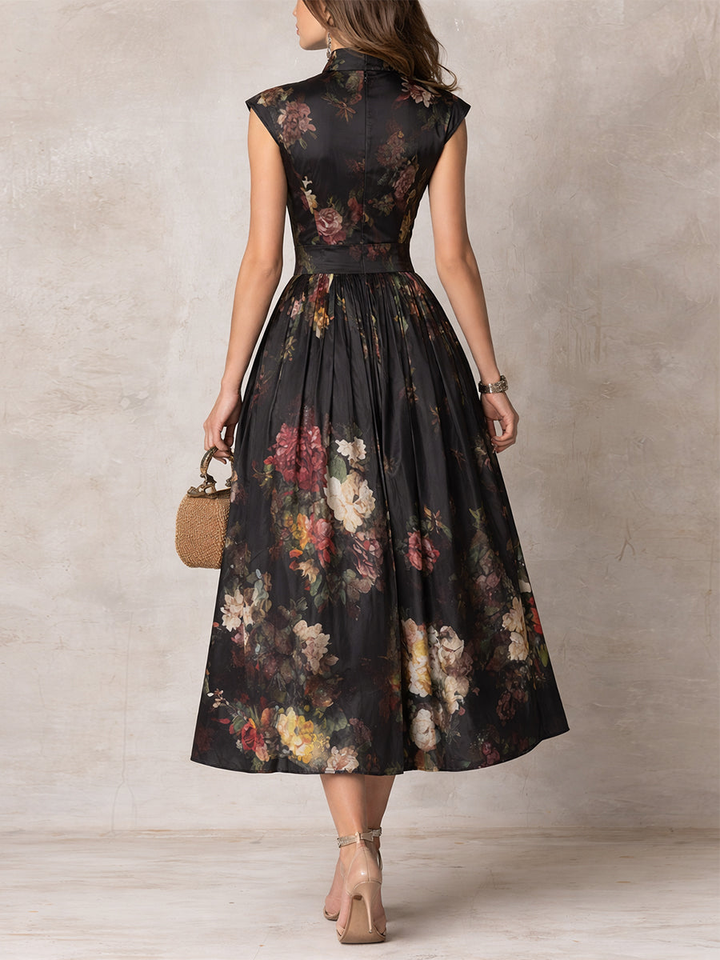 Modisches A-Linie Midi-Kleid für Damen, schwarz mit Blumenmuster. Ideal für festliche Anlässe & Abendgarderobe.