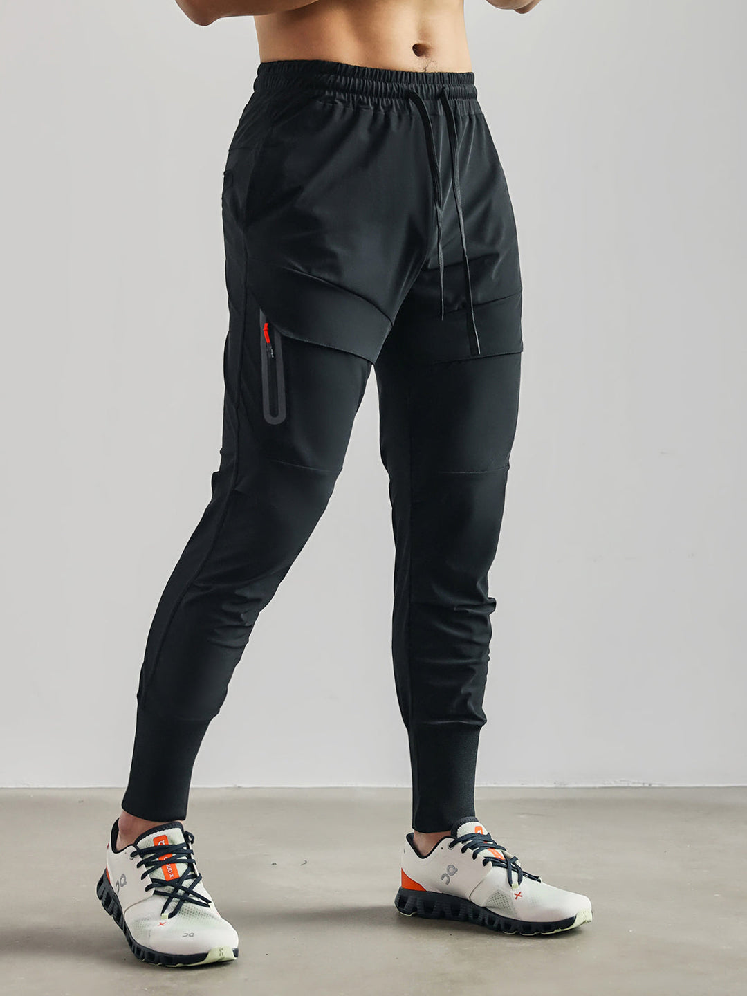 Dunkle Herren Stretch-Athletikhose für Sport & Alltag, maximale Bewegungsfreiheit & Komfort.