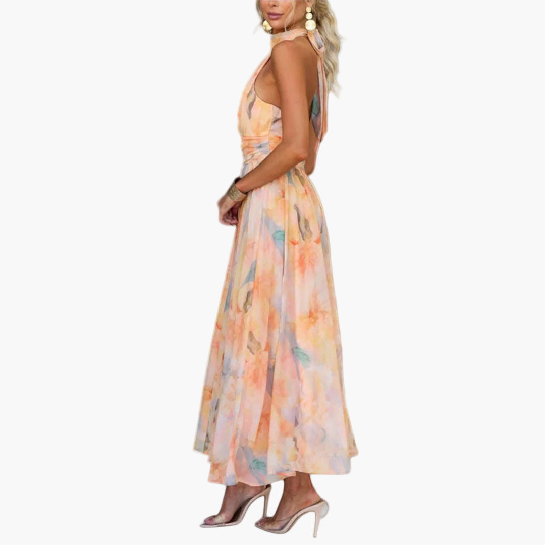 Festliches Damen Maxikleid mit elegantem Wasserfarbenmuster. Fließender Stoff für einen stilvollen Auftritt am Abend.