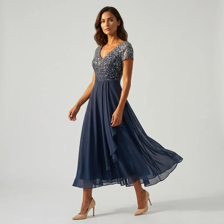 Schickes Damen A-Linien Partykleid, wadenlang, elegant bestickt mit kurzen Ärmeln für besondere Anlässe.